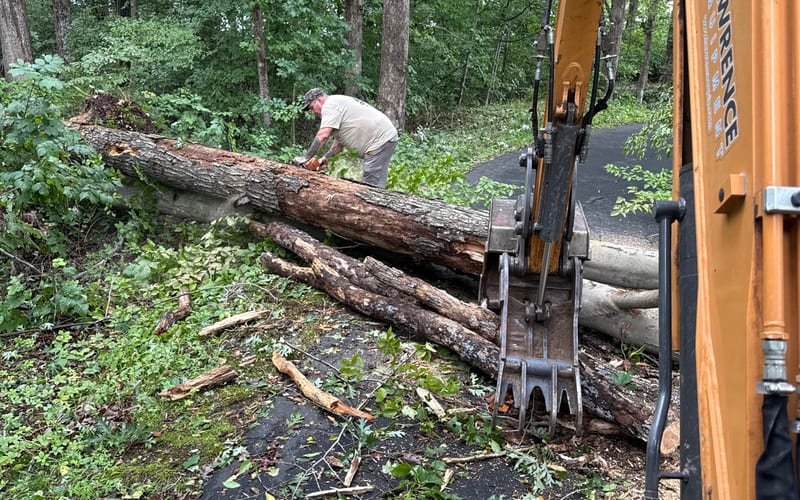 Heavy equipment operator on a land clearing job site